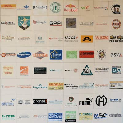 Werbeagentur K-Design: Logodesign Firmenlogos auf Fliesen