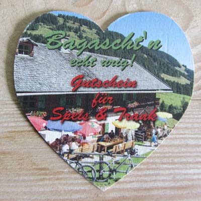 Werbeagentur K-Design: Grafikdesign Gutschein Herzbierdeckel Baumgartenalm